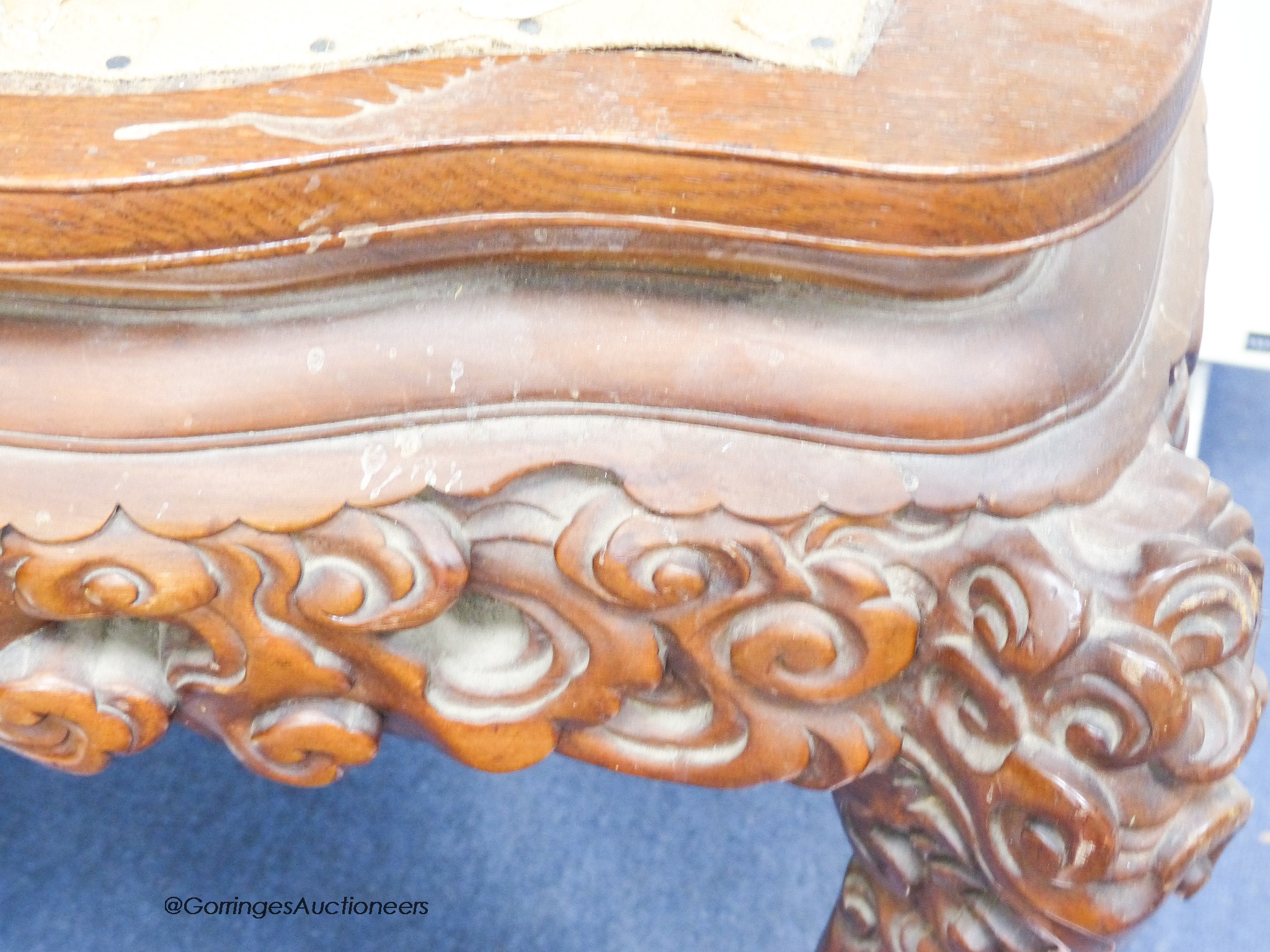 A Chinese carved elbow chair